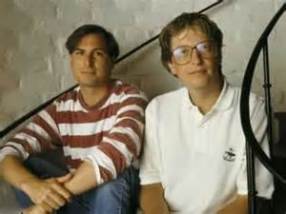 Karl Rosenberg as Steve Jobs, with Bill Gates.